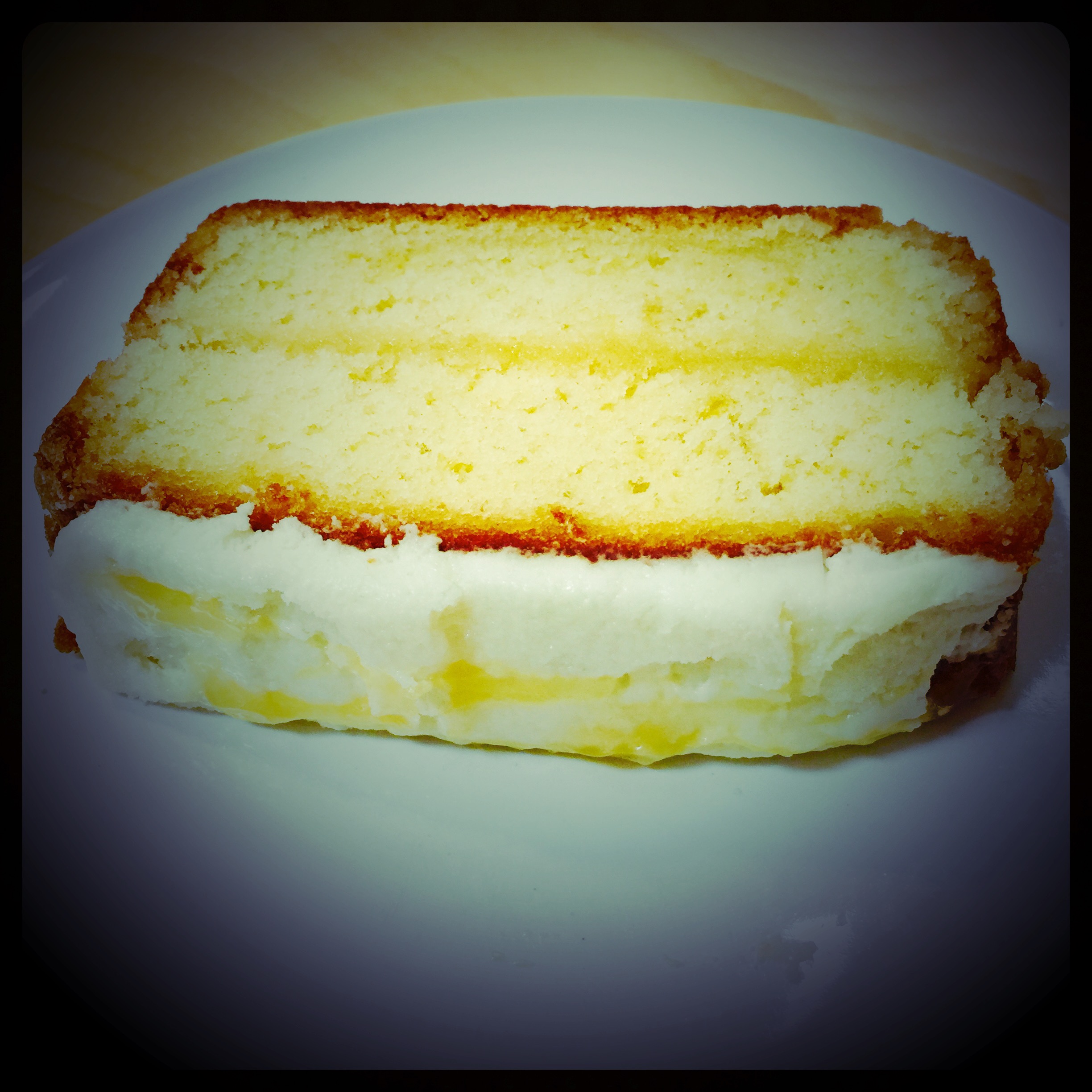 a slice of lemon drizzle cake